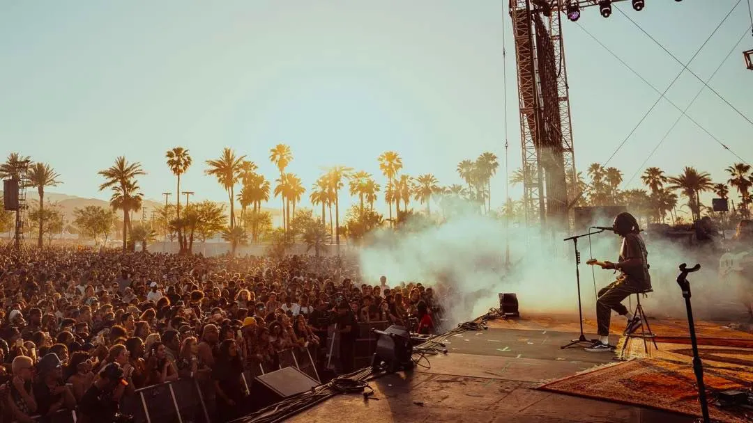 music festival stage with crowd cheering